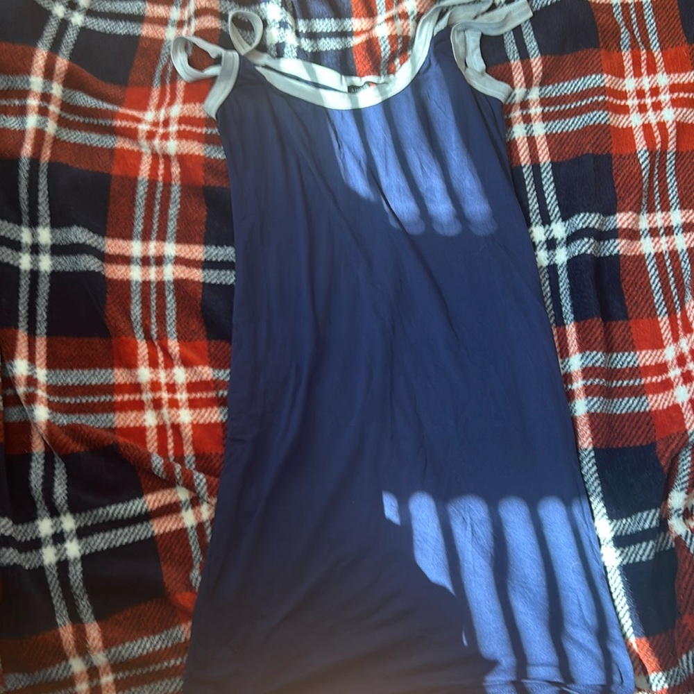 Blue dress in a size medium never worn in good condition